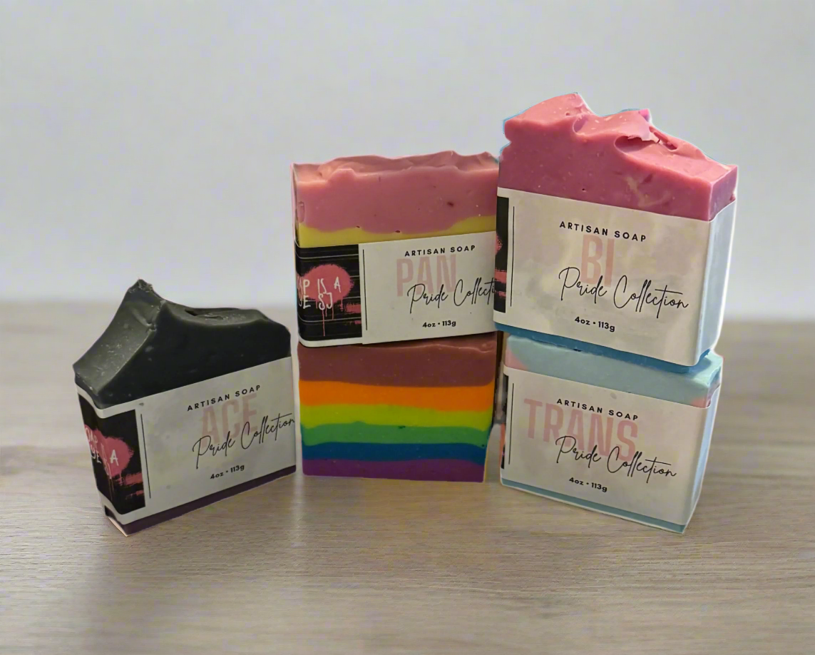 Pride soap collection featuring Rainbow, Ace, Pan, Trans, and Bi Pride artisan soap.