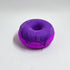 pink donut bath bomb with purple frosting that smells like watermelon candy. This bath bomb will make your bath water pink and purple