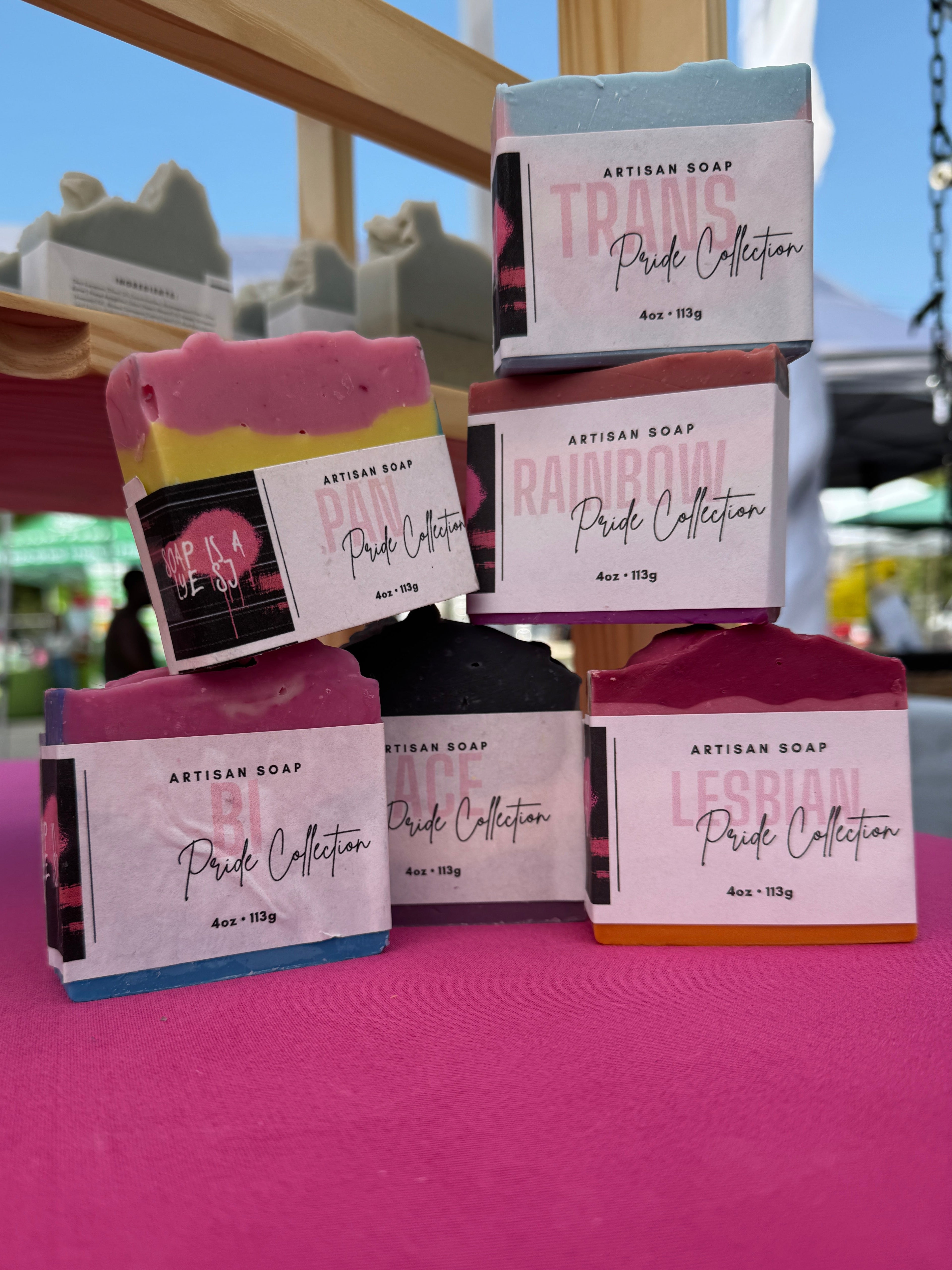 Packaged products on a pink surface with a blurred outdoor background