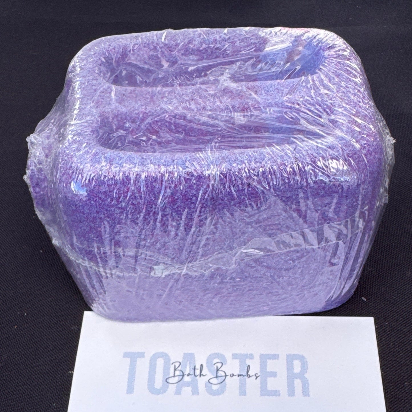 Purple Toaster bath bomb with ingredients list Made in California